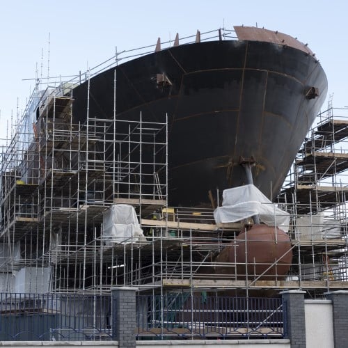 Ship being built in a harbour